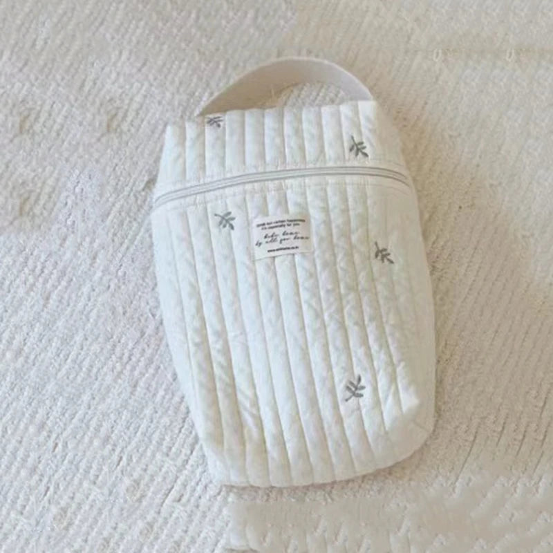 Trousse de toilette femme suspendue matelassée