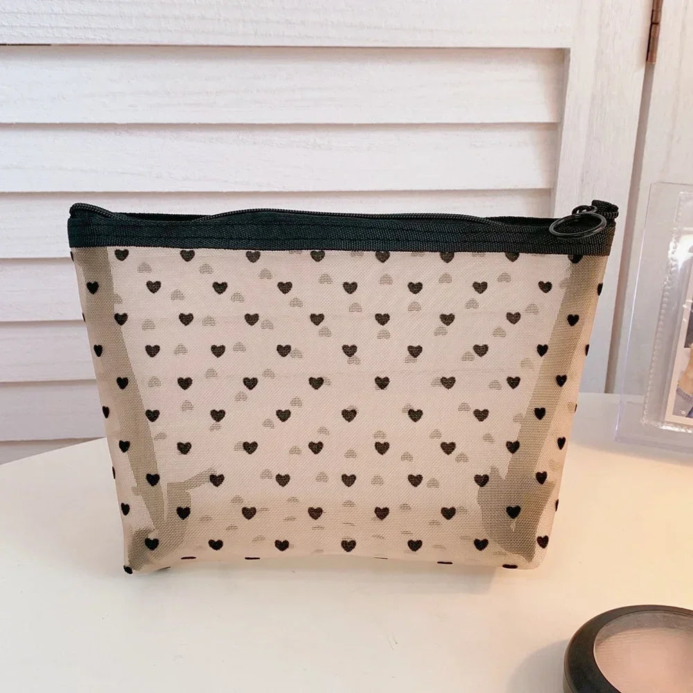 Trousse de toilette femme maille transparente