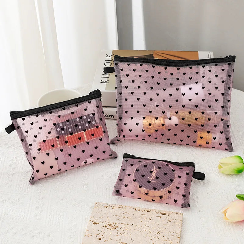 Trousse de toilette transparente cœur - Format mini & tendance