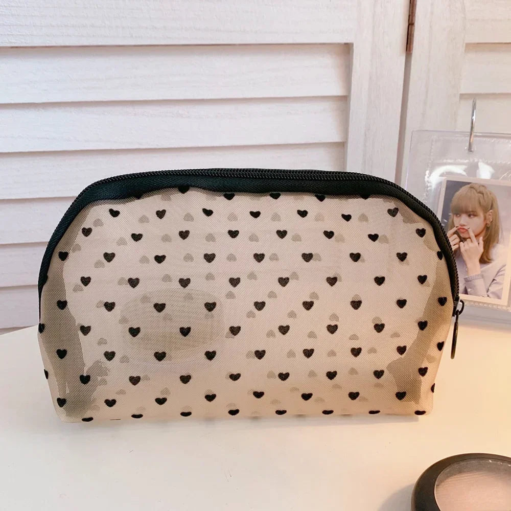 Trousse de toilette femme maille transparente