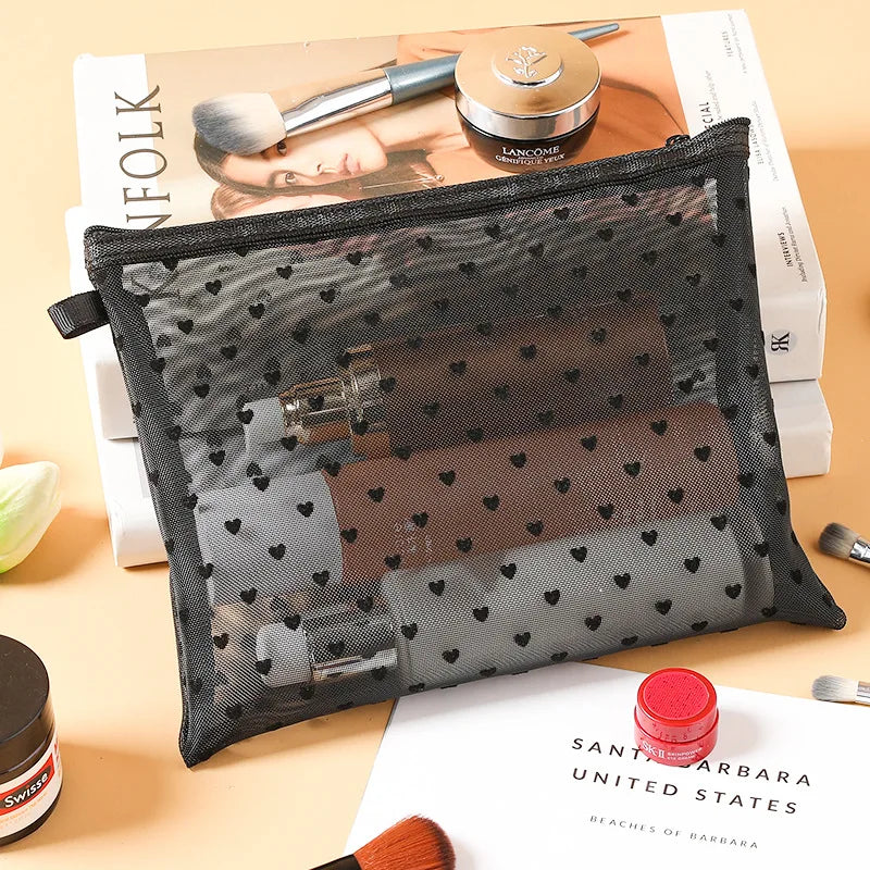 Trousse de toilette transparente cœur - Format mini & tendance