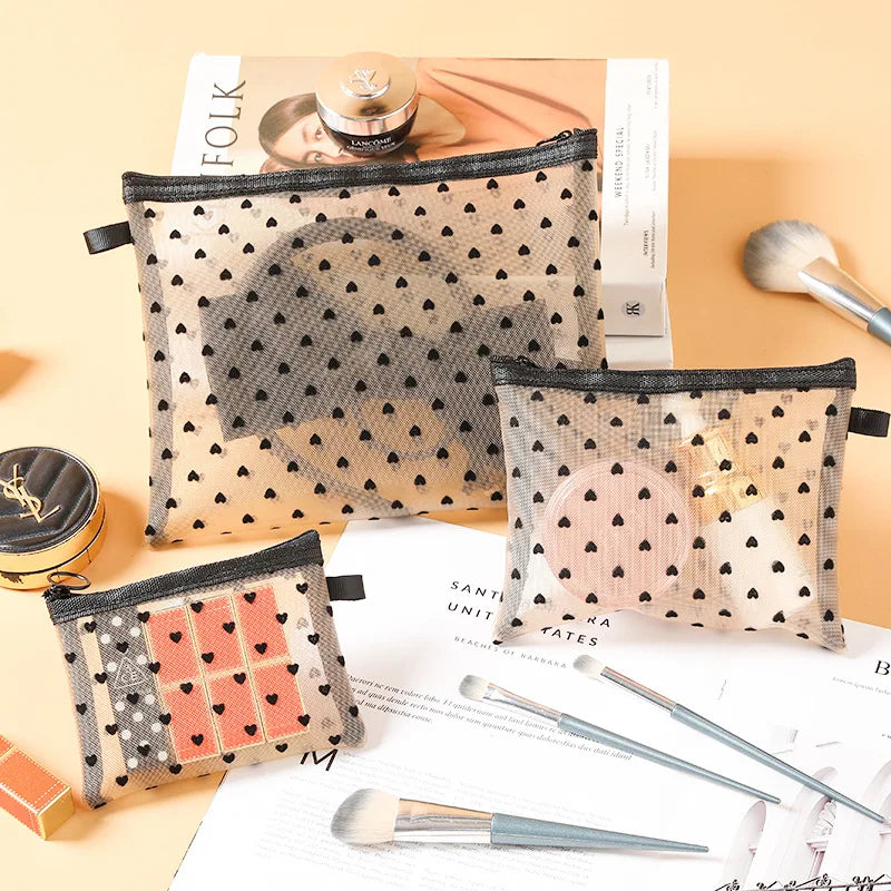Trousse de toilette transparente cœur - Format mini & tendance