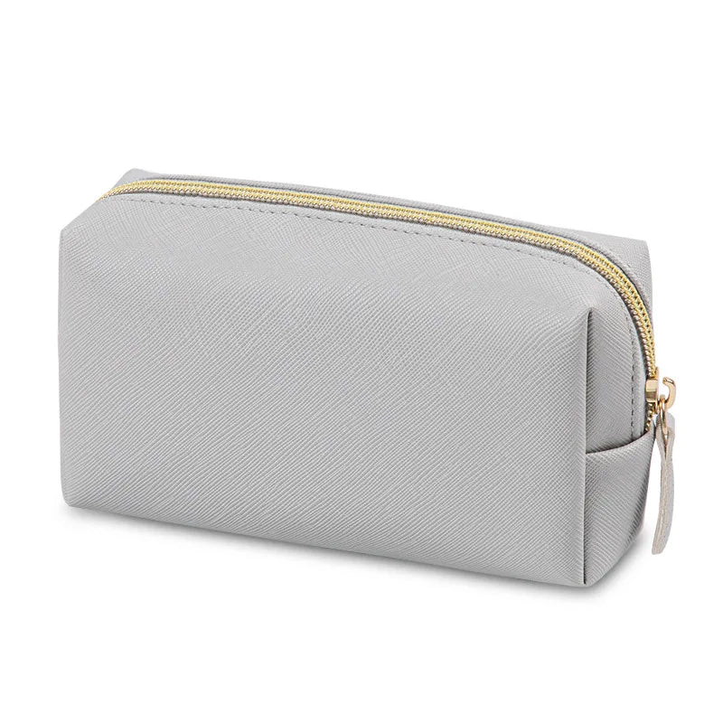 Trousse de toilette imperméable élégante et pratique – finition grise minimaliste avec fermeture zippée dorée