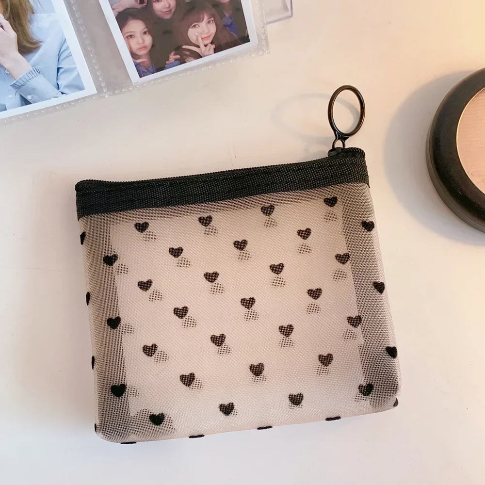 Trousse de toilette femme maille transparente