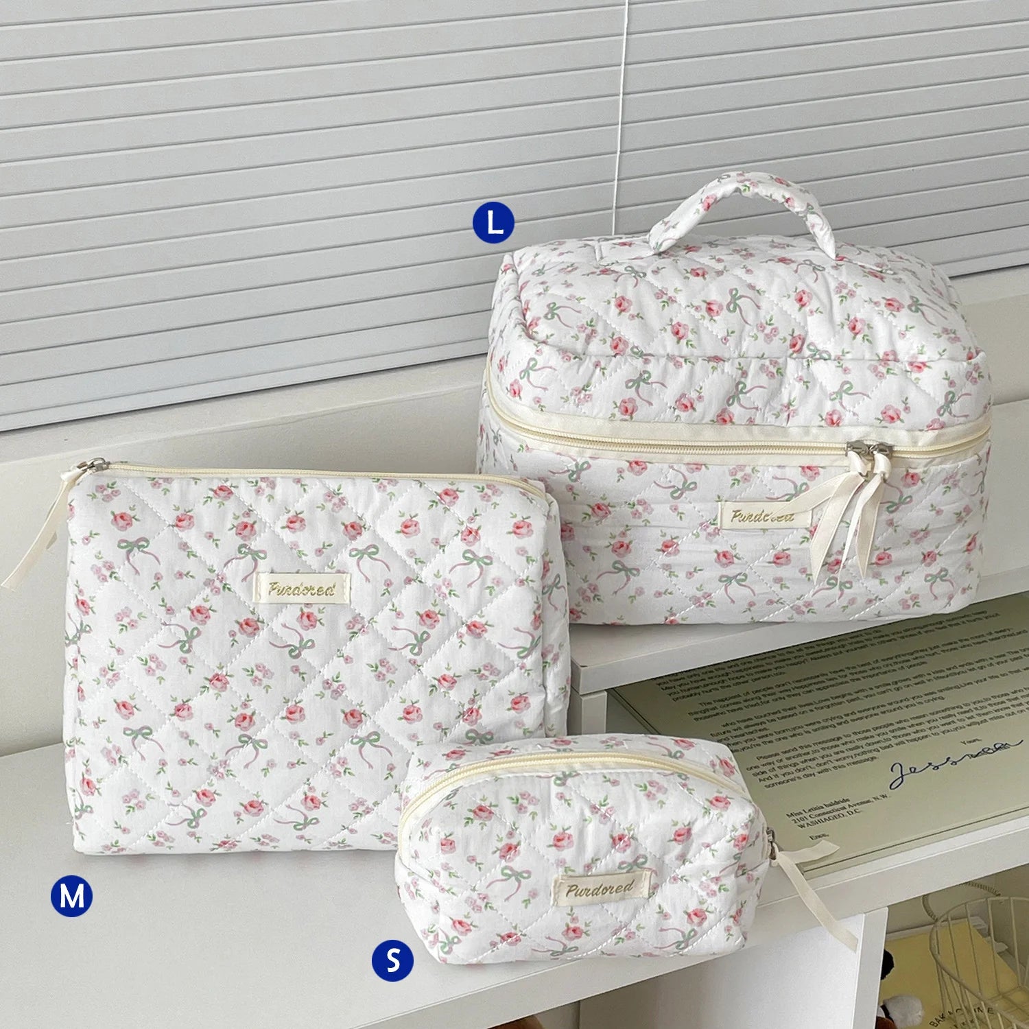 Trousse de toilette femme compacte matelassée